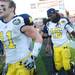 Michigan safety Jordan Kovacs and senior quarterback Denard Robinson walk off the field after loosing to South Carolina 33-28 in the Outback Bowl at Raymond James Stadium in Tampa, Fla. on Tuesday, Jan. 1. Melanie Maxwell I AnnArbor.com
